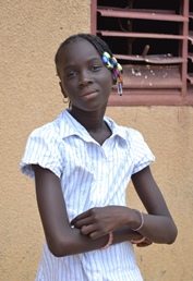 Girl stands outside classroom in Senegal.jpg