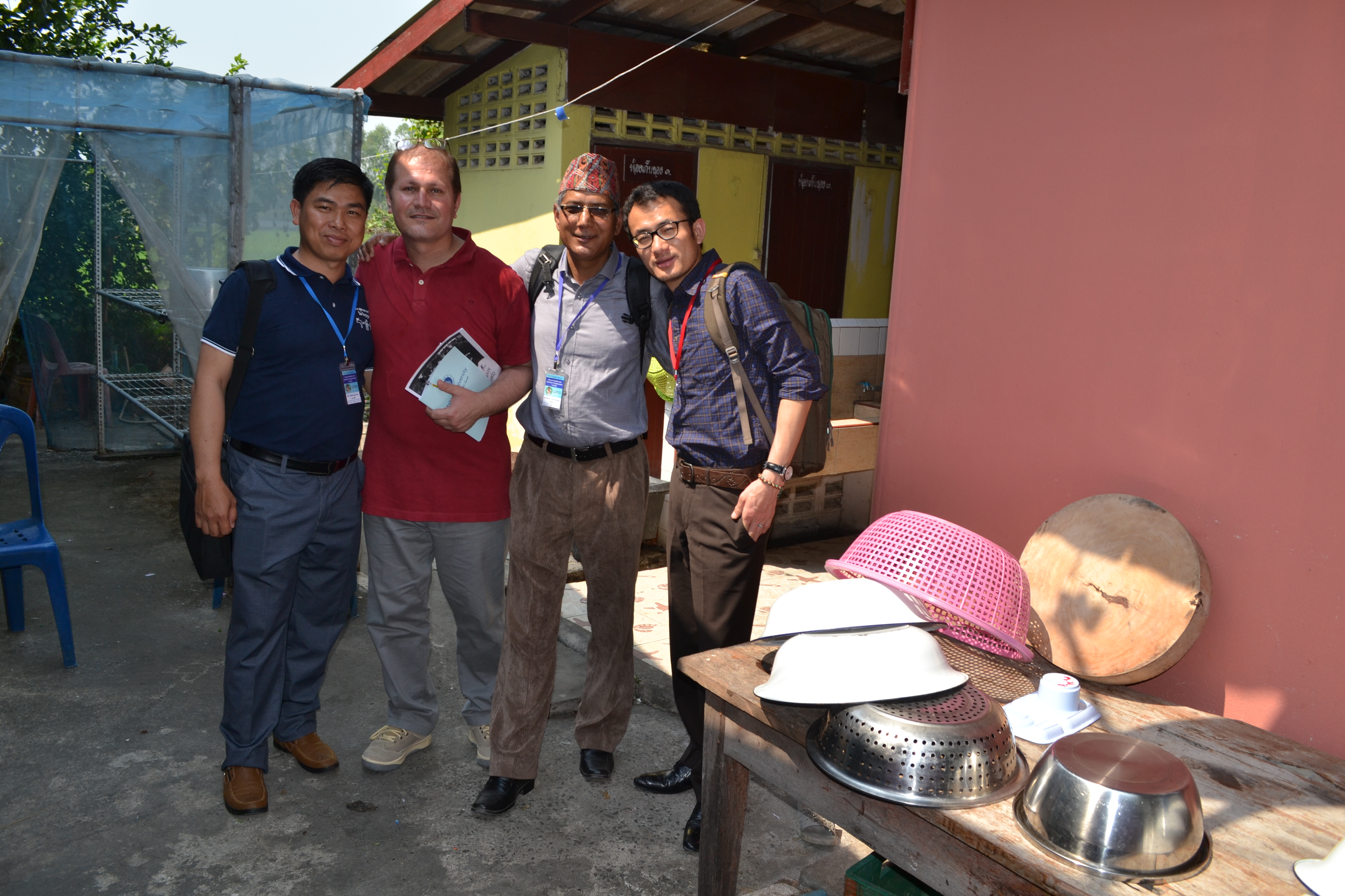 Bhutan's Sangay Thinley (R) on a school visit with colleagues from Nepal, Pakistan and Cambodia