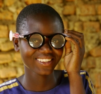 Child in Africa with refractive classes.jpg