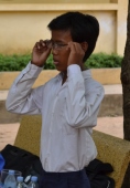 Boy having eyes testing in Cambodia.jpg