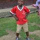 Ghanaian schoolboy posing for camera 