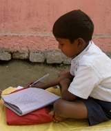 Boy studying in India