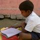 Boy studying in India