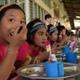 School children eating lunch in Thailand 