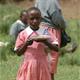 Girl with lunch in Kenya