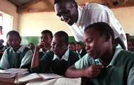 Paul Tergat, Marathon Runner and WFP Ambassador with African school children