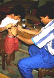a child's medical examination in Indonesia